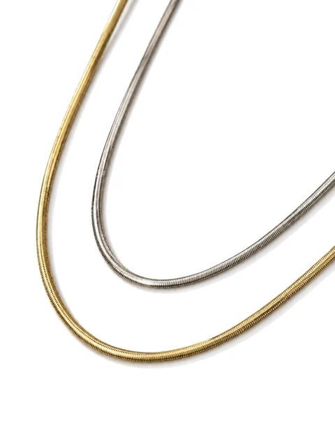 Gold-tone and silver-tone Silkline 3mm snake-chain necklaces displayed together, view 1